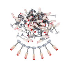 Collection of metal tools with red and white handles on a white background
