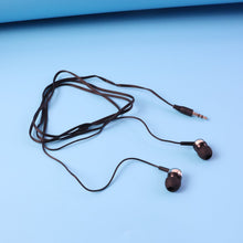 Black earphones with a coiled cable on a blue background