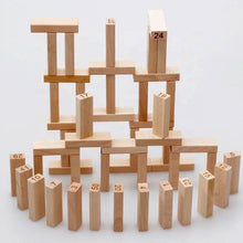 Wooden blocks with numbers arranged in a geometric pattern on a white background