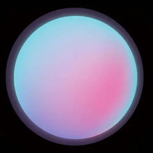 Gradient color swatch transitioning from blue to pink on a black background