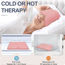 Person using a pink heating pad with instructions for cold or hot therapy.