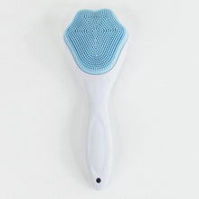 Blue silicone scrubber on a white background