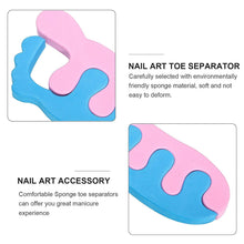 Nail art toe separator with pink and blue design on a white background