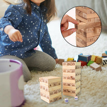 Child playing with wooden blocks featuring numbers, with a close-up of the blocks and a cup in the foreground.