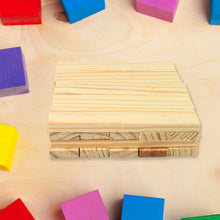 Wooden block with colorful blocks on a wooden surface