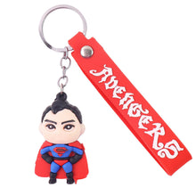 Superhero keychain with red strap displaying 'Avengers' on a white background