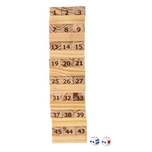 Wooden number blocks with dice on a white background