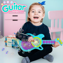 Child playing with a guitar-shaped bubble machine, surrounded by bubbles.