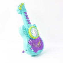 Toy guitar with purple and green accents on a white background