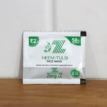 Neem Tulsi face wash packaging on a wooden surface with a white background