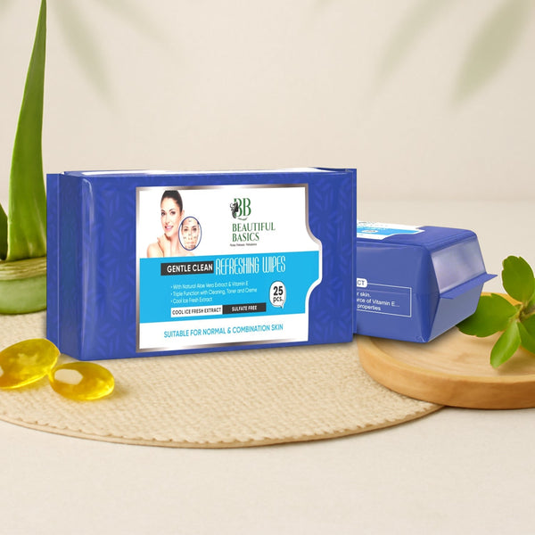 Box of Beautiful Basics refreshing wipes on a neutral background with plants.
