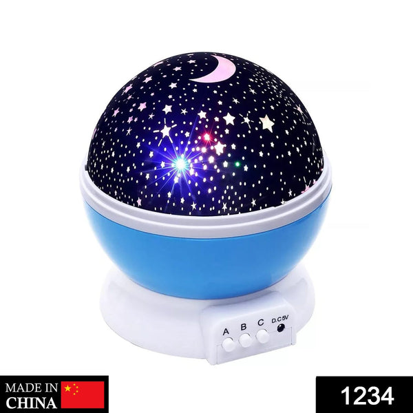 Starry night light projector with blue base and dark blue top on a white background
