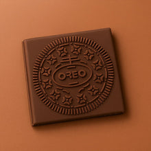 Chocolate Oreo cookie on a brown background