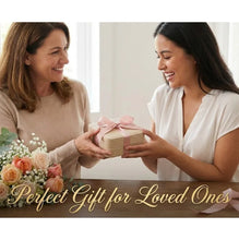 Two women exchanging a gift with flowers on a table, text 'Perfect Gift for Loved Ones' below.