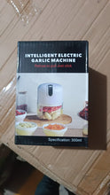 Box of an intelligent electric garlic machine on a wooden surface