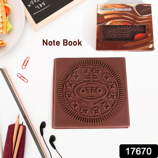 Chocolate notebook with Oreo design on a white surface with stationery items.