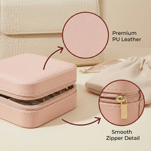Pink jewelry case with close-up details on texture and zipper, set against a beige background.