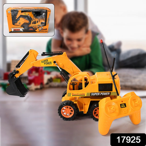 Toy excavator with remote control on a table, child playing in the background