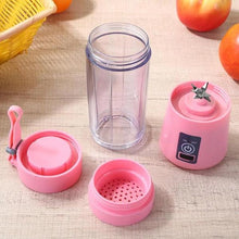 Pink portable blender with components on a wooden surface
6-Blades Protein Shaker Blender Cup (380 ML)
