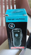 Product packaging with 'High-light Long Distance' text on a blurred background