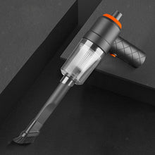 Handheld vacuum cleaner on a dark background