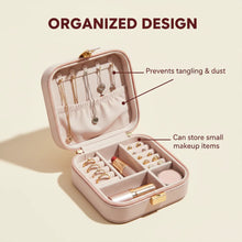 Pink jewelry and makeup organizer with labeled features on a beige background