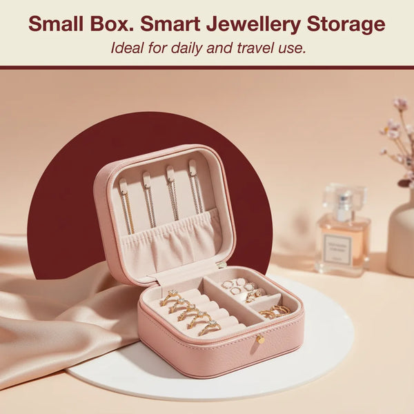 Pink jewellery storage box with jewelry