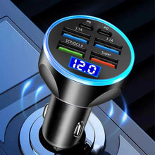 Car charger with multiple charging ports and digital display on a reflective surface