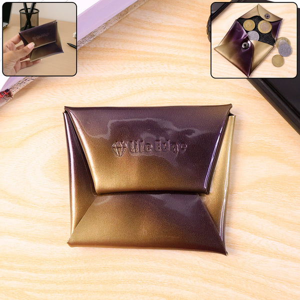 Gold and purple makeup pouch with 'Wet n Wild' 
