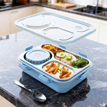 Blue bento box with compartments containing food on a kitchen counter