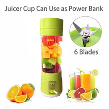 Green juicer cup with fruit inside, showing 6 blades, and a glass of juice with a straw.