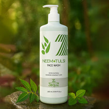 Neem Tulsi face wash bottle with green leaves on a natural background