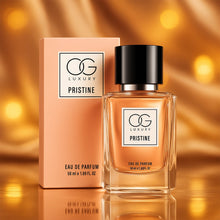 OG Luxury Pristine perfume bottle and packaging on a reflective surface with a blurred gold background