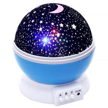 Starry night light projector with blue base and black top displaying stars and moon.