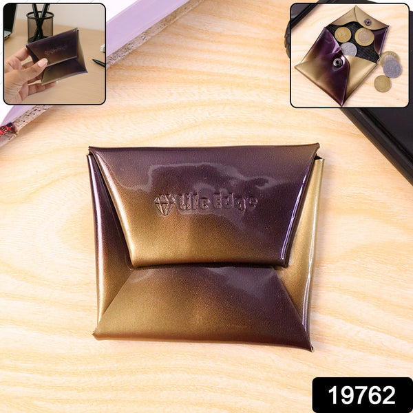 Gold and purple makeup pouch with 'Wilted Lily' branding on a wooden surface.