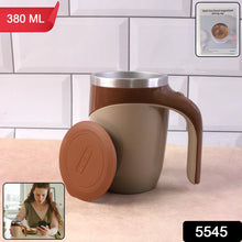 Brown mug with handle and brown lid on a white tiled wall background