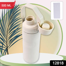 White water bottle with a detachable cap on a green and beige background