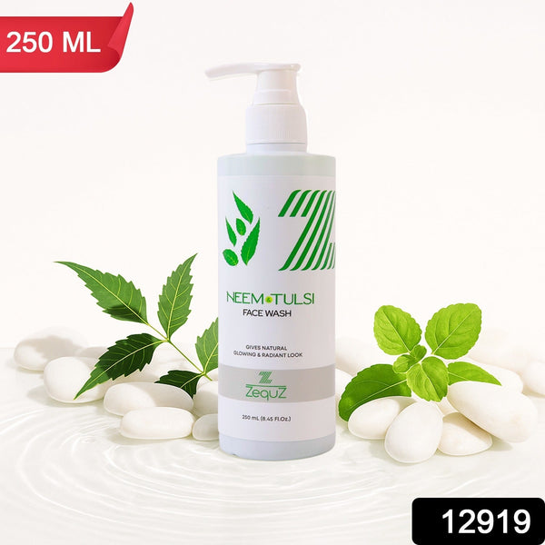 Neem Tulsi face wash bottle with green leaves and white stones on a light background