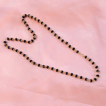 Statement gold bead necklace        
