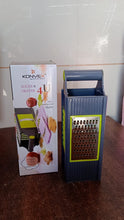 Konvex slicer and grater with packaging on a tiled wall background