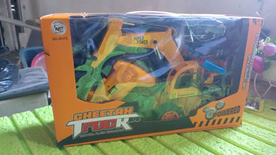 Toy truck in packaging on a green surface